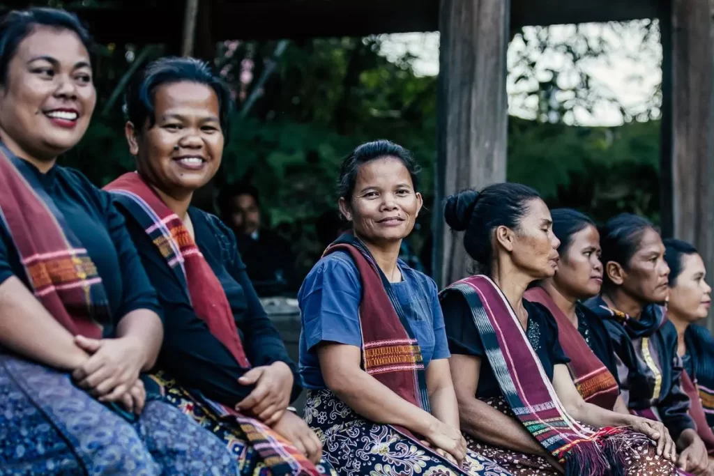local people wearing ulos in in samosir, toba, north sumatra