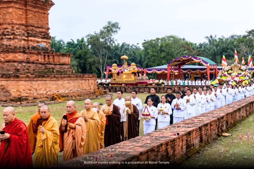 Buddhist monks walking in a procession at Bahal Temple