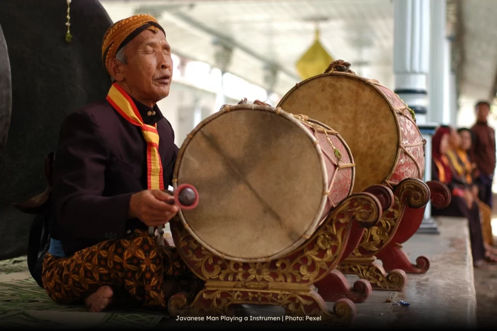 Javanese Man Playing a Instrumen
