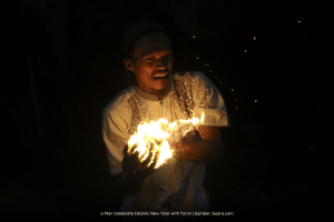 Man Celebrate Islamic New Year with Torch