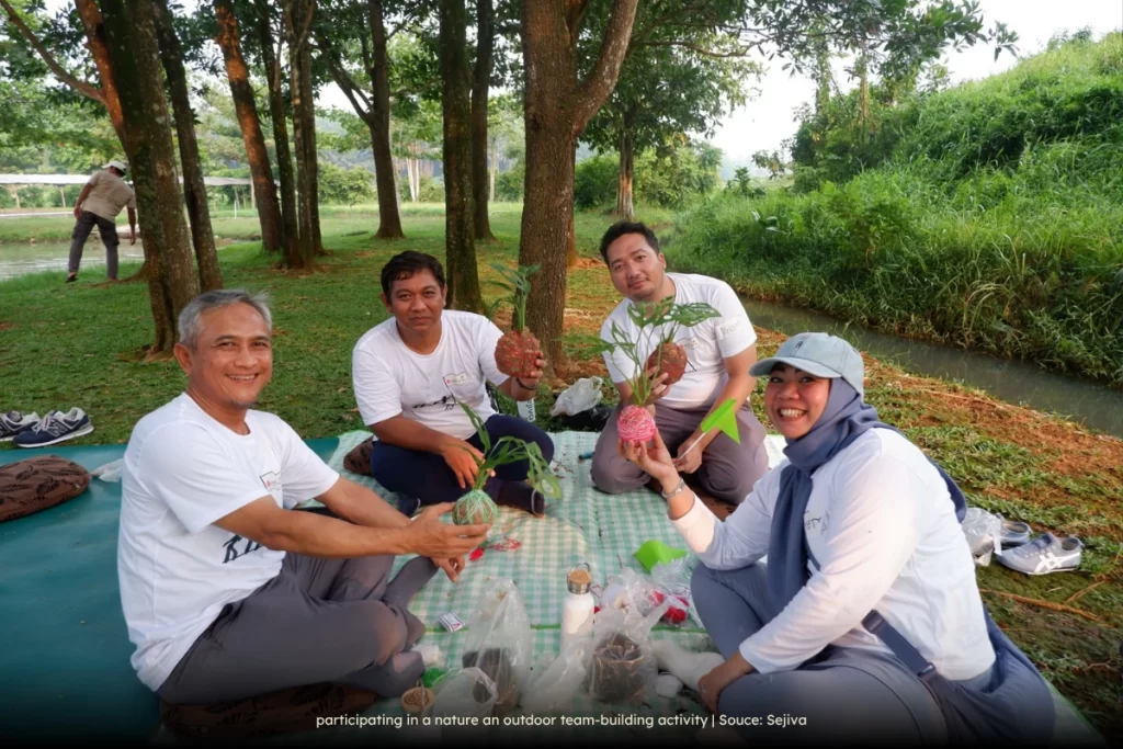 Participating in a nature an outdoor team-building activity